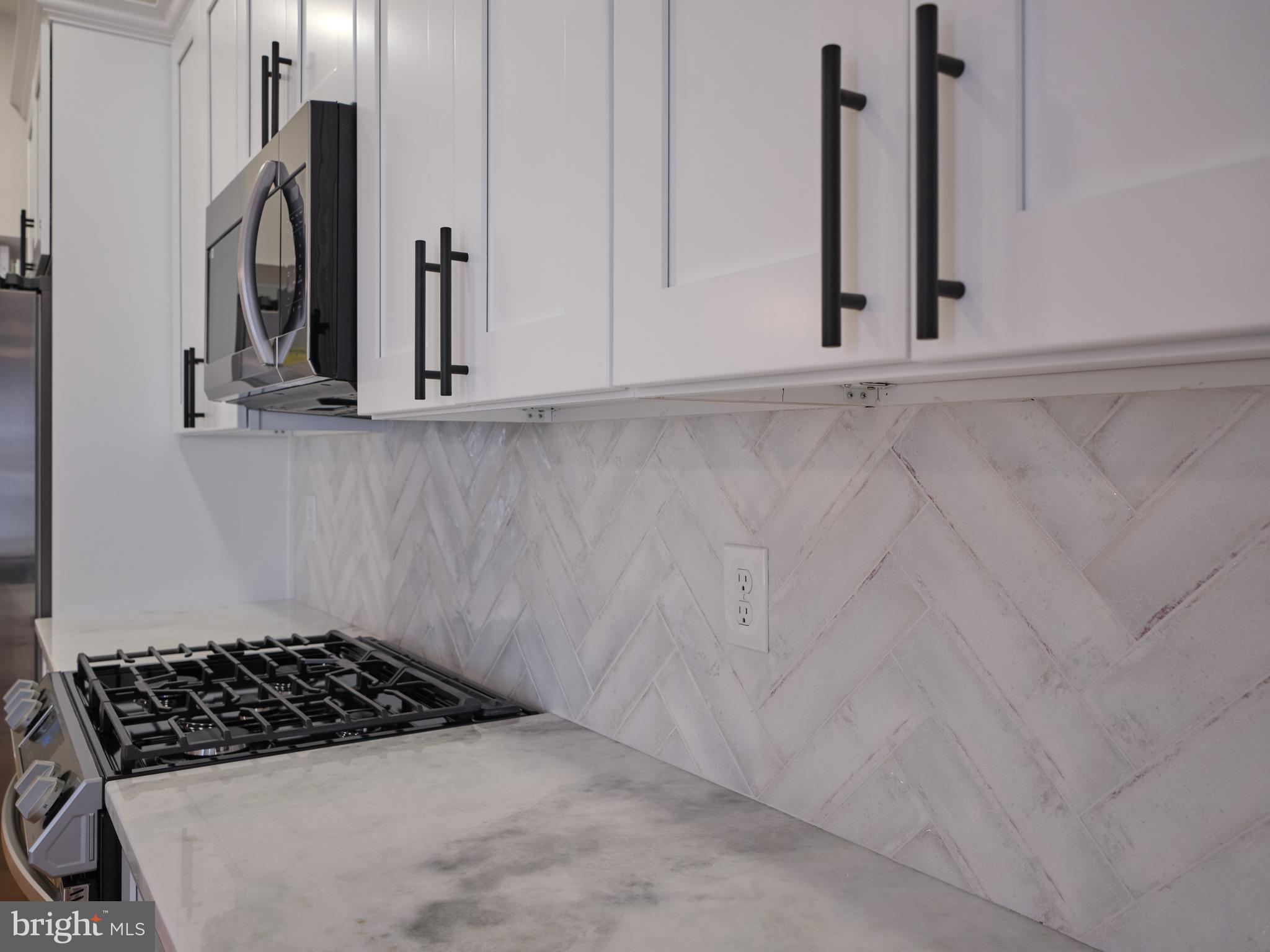 32 South State Street, Unit 2 Newtown, PA 18940 - Photo 12 of 26 Designer herringbone back splash