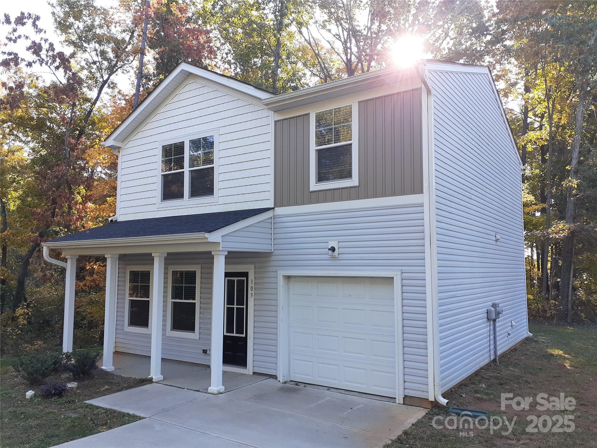 103 Spring Drive Salisbury, NC 28144 - Photo 20 of 21 a front view of a house with a yard