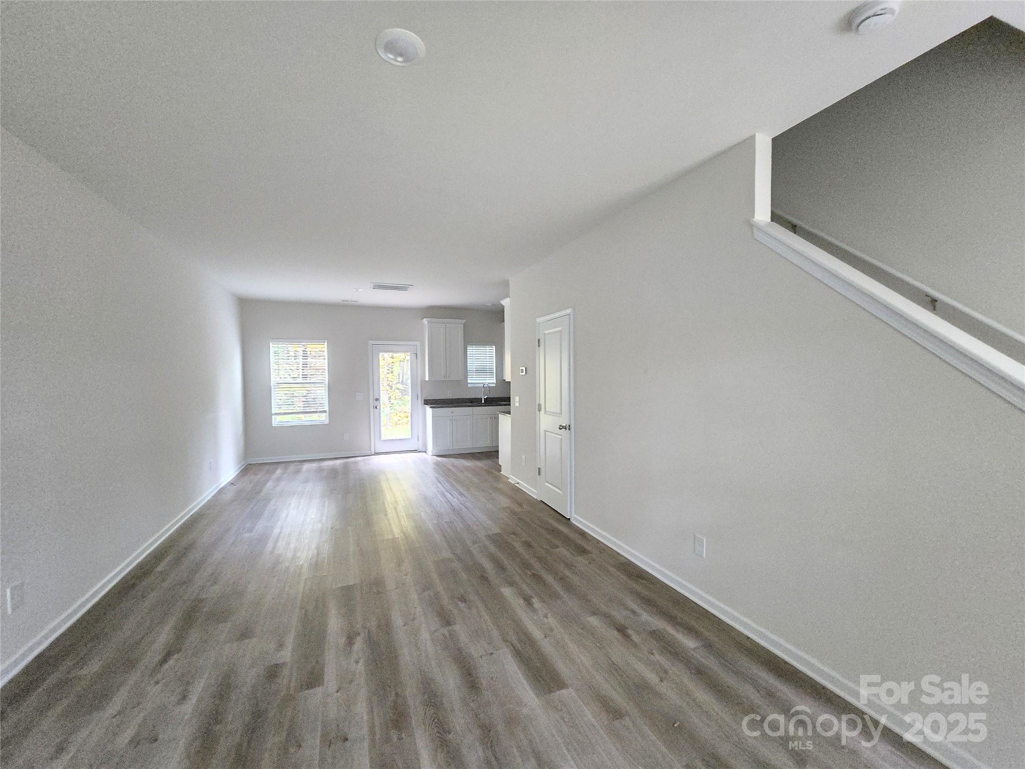 103 Spring Drive Salisbury, NC 28144 - Photo 3 of 21 a view of empty room with wooden floor