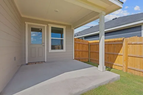 a view of a backyard of a house