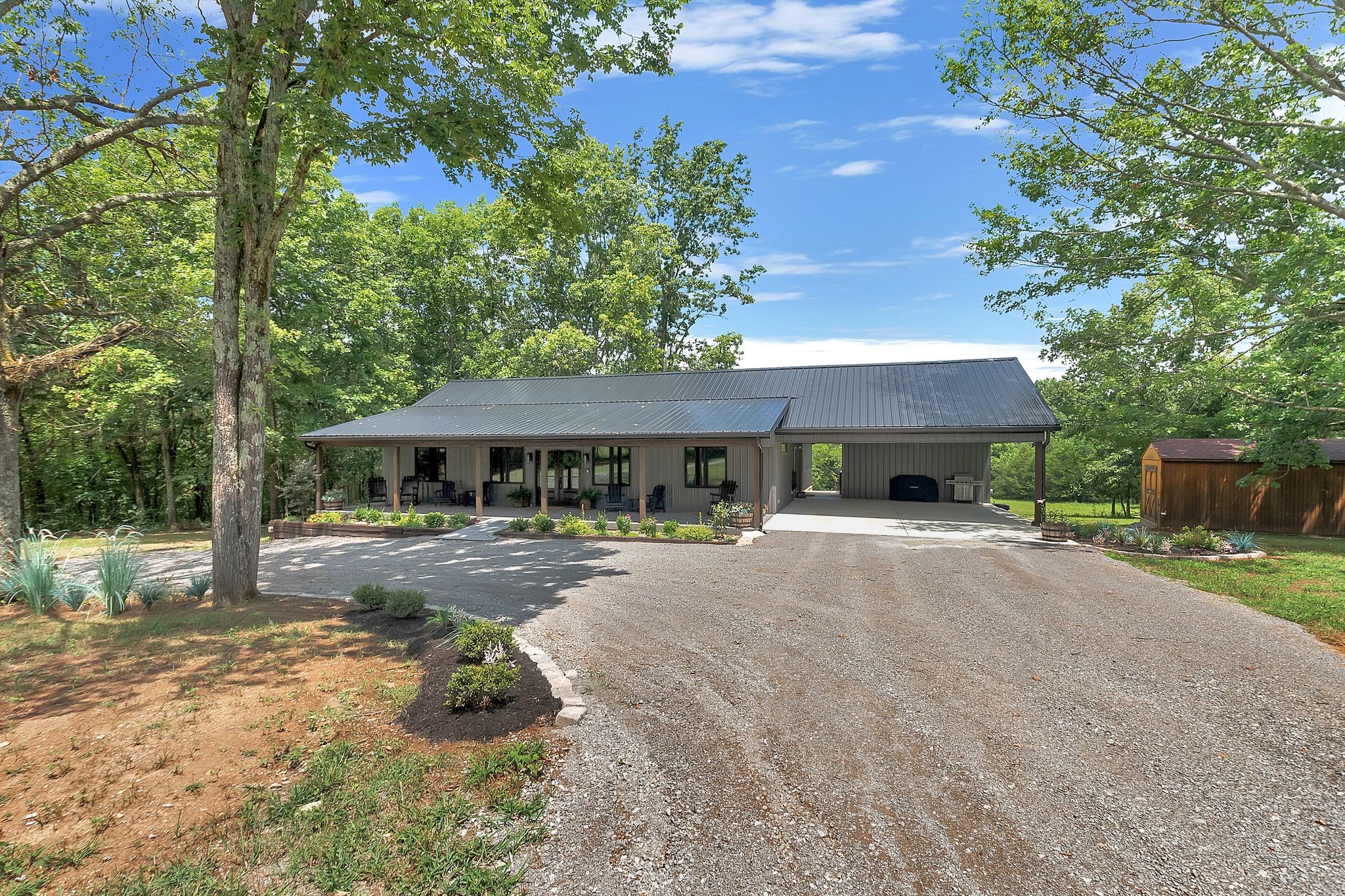 704 Beasleys Bend Road Lebanon, TN 37087 - Photo 3 of 35 a view of a house with backyard and sitting area
