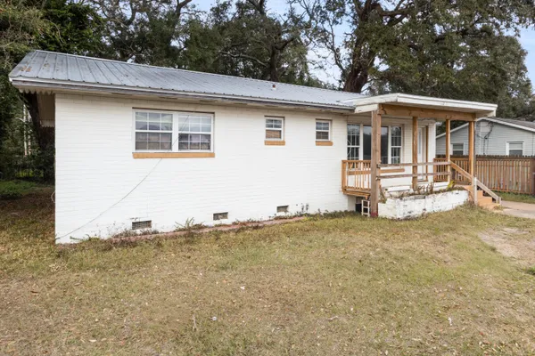 a house with yard in front of it