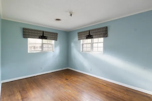 an empty room with windows