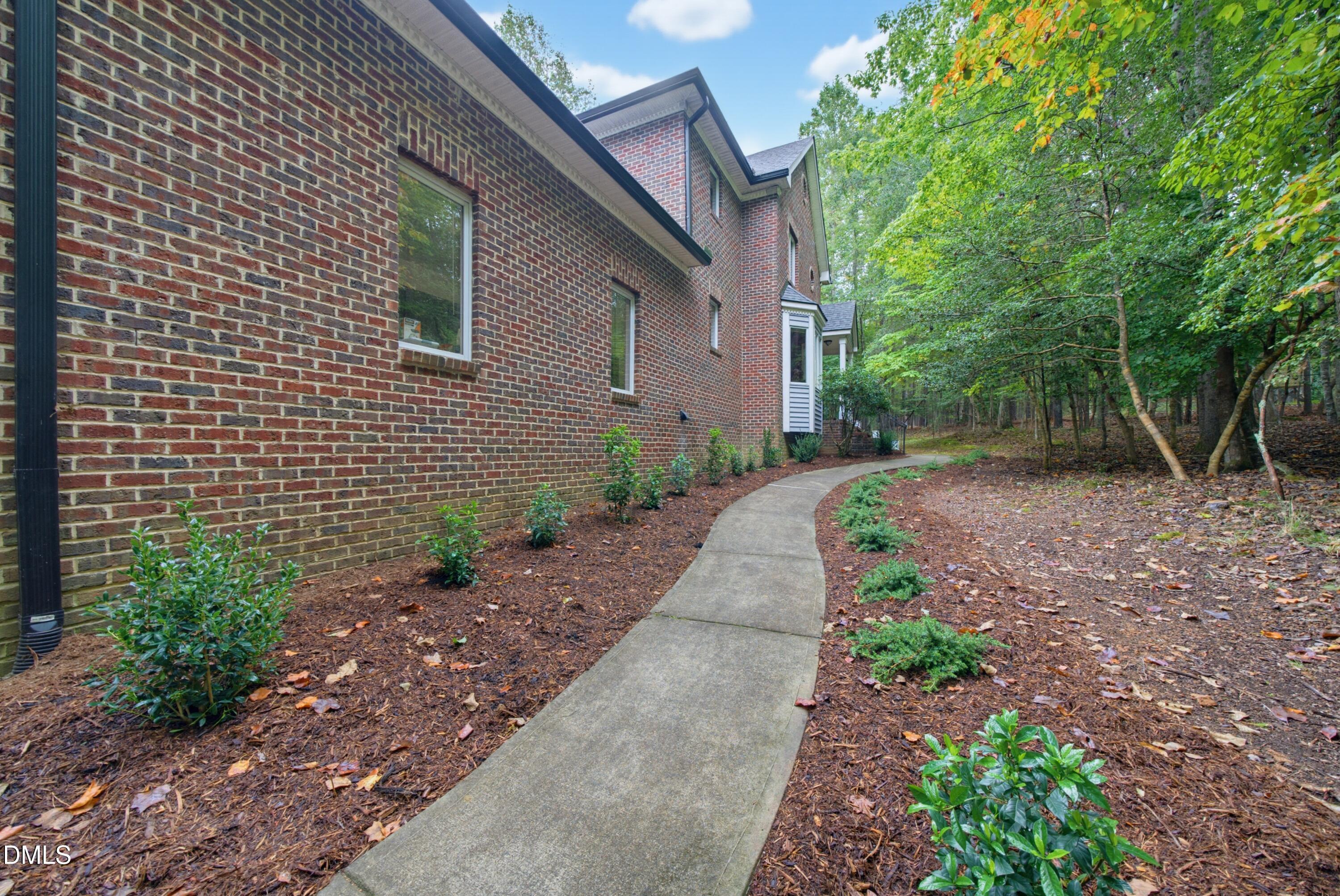 1105 Erins Way Lane Raleigh, NC 27614 - Photo 2 of 82 Side walk from front parking pad