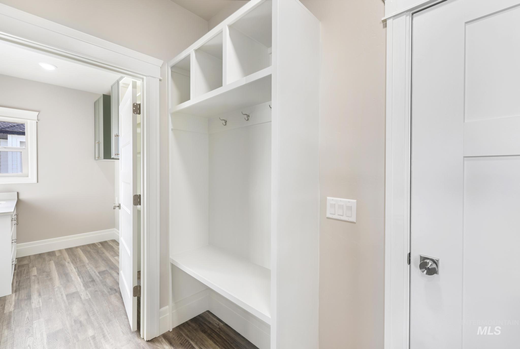 1316 K Street Rupert, ID 83350 - Photo 17 of 44 Mudroom with light wood-type flooring and baseboards