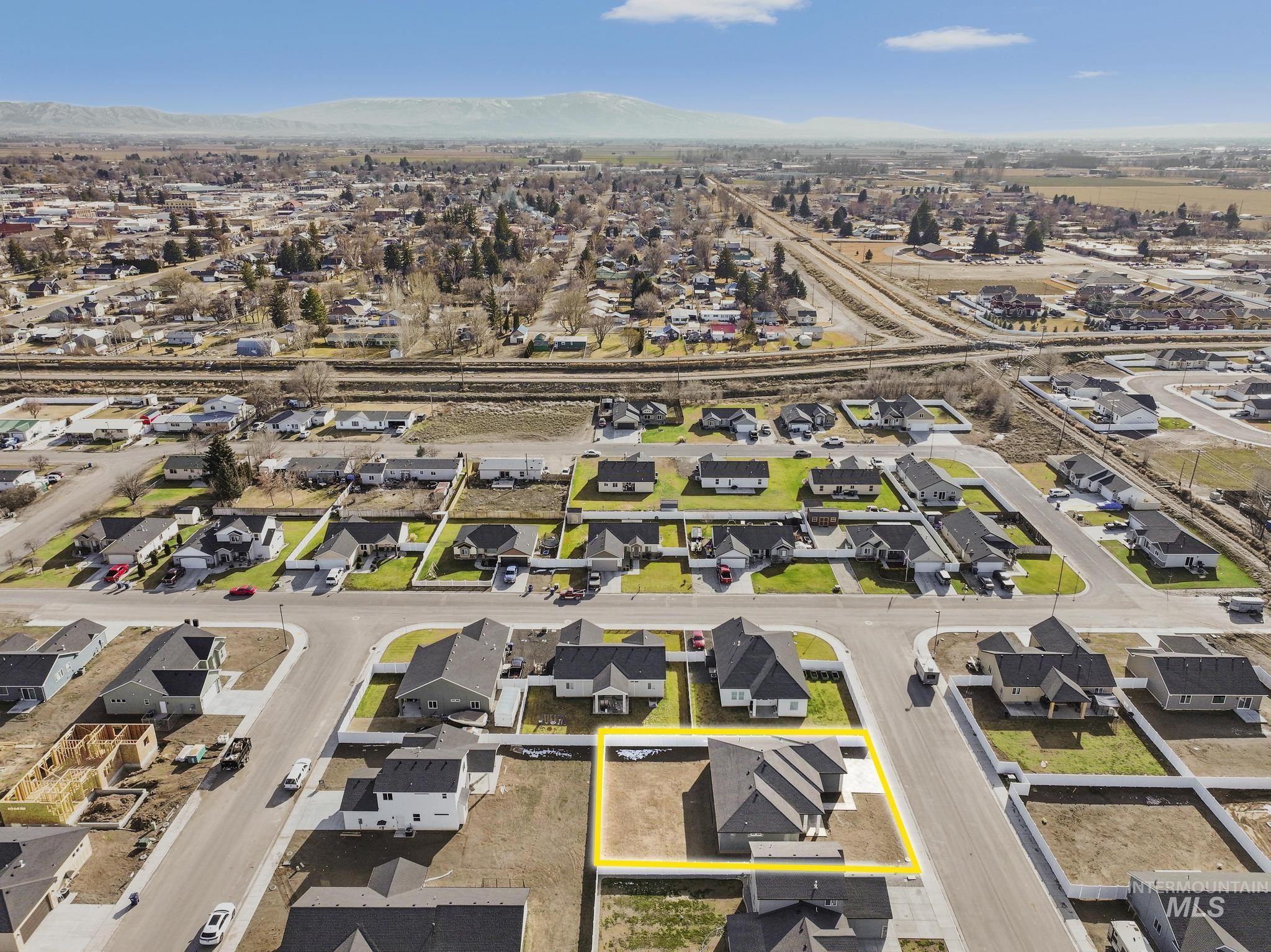 1316 K Street Rupert, ID 83350 - Photo 41 of 44 Aerial view of property's location featuring property parcel outlined and nearby suburban area
