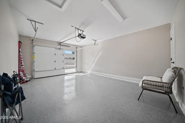 a view of an empty room with windows