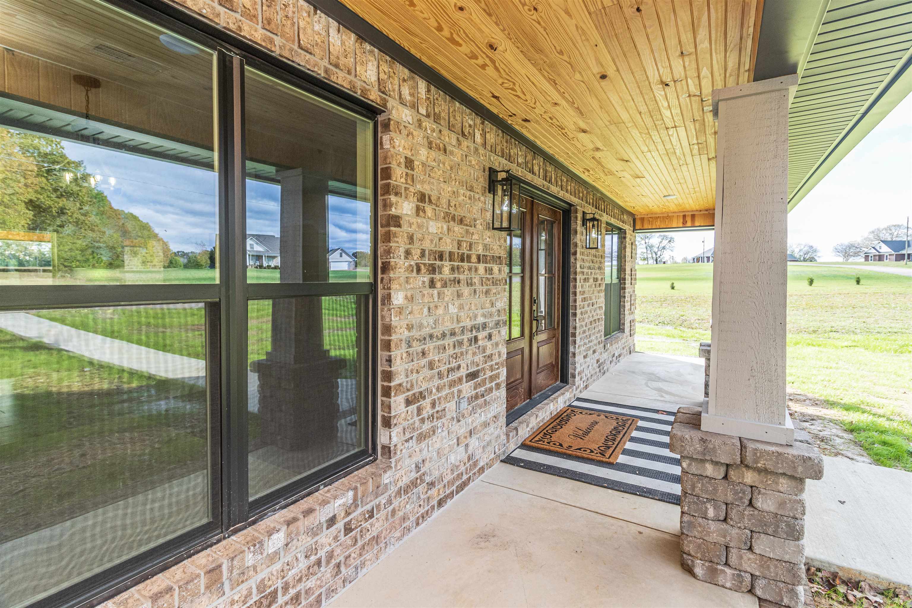 150 Windchase Cove Adamsville, TN 38310 - Photo 3 of 21 Property entrance with a porch