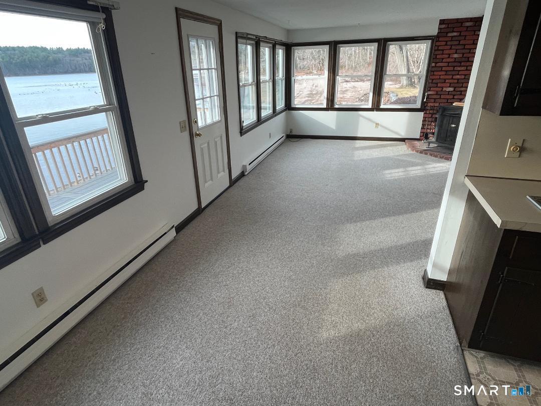 71 Ellington Road Tolland, CT 06084 - Photo 14 of 25 Dining Room to Living Room