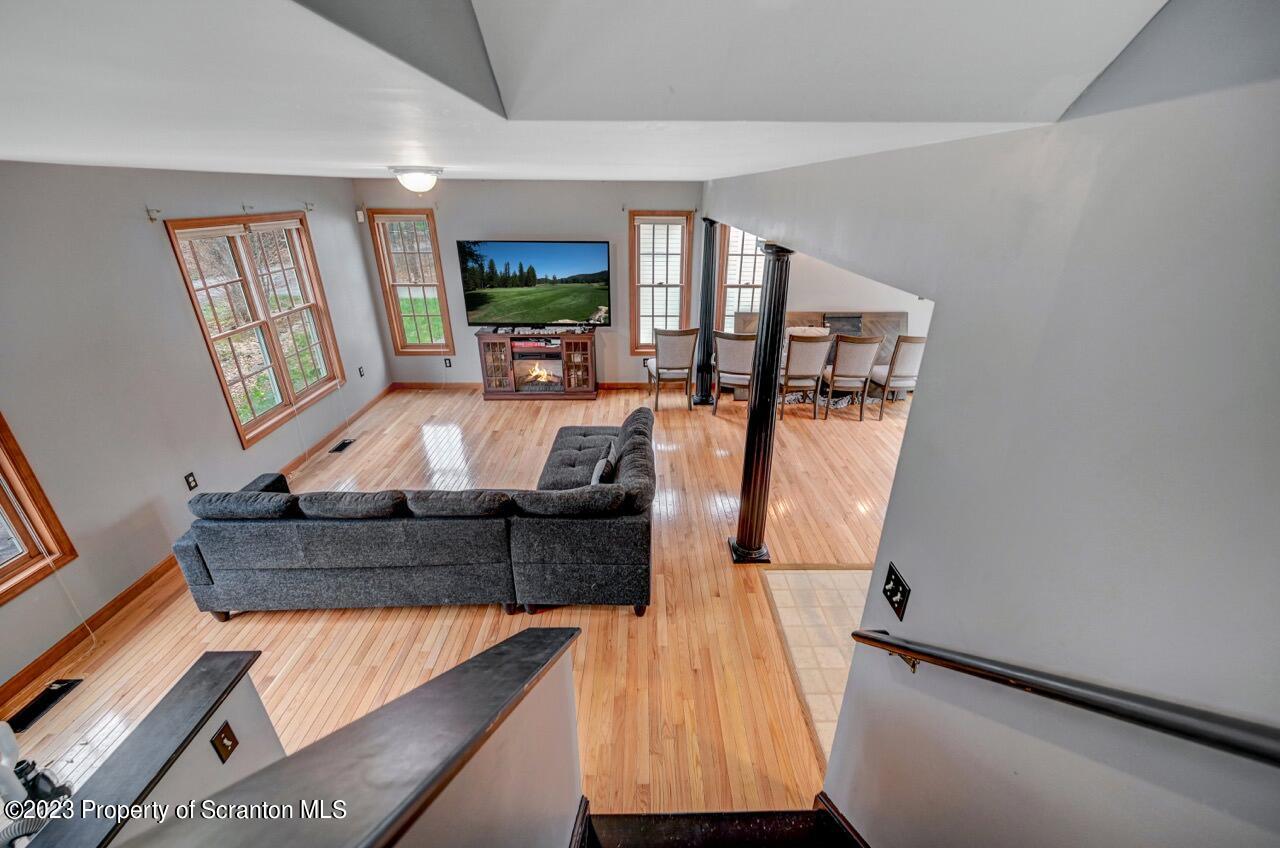 4156 Romeo Road Tobyhanna, PA 18466 - Photo 20 of 46 a living room with furniture and a flat screen tv