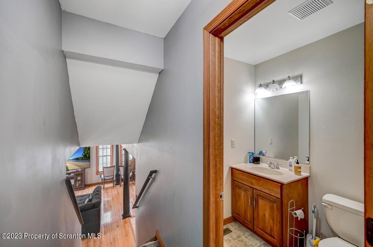 4156 Romeo Road Tobyhanna, PA 18466 - Photo 21 of 46 a bathroom with a double vanity sink and a mirror