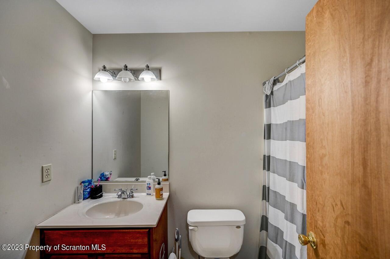 4156 Romeo Road Tobyhanna, PA 18466 - Photo 22 of 46 a bathroom with a sink toilet and shower