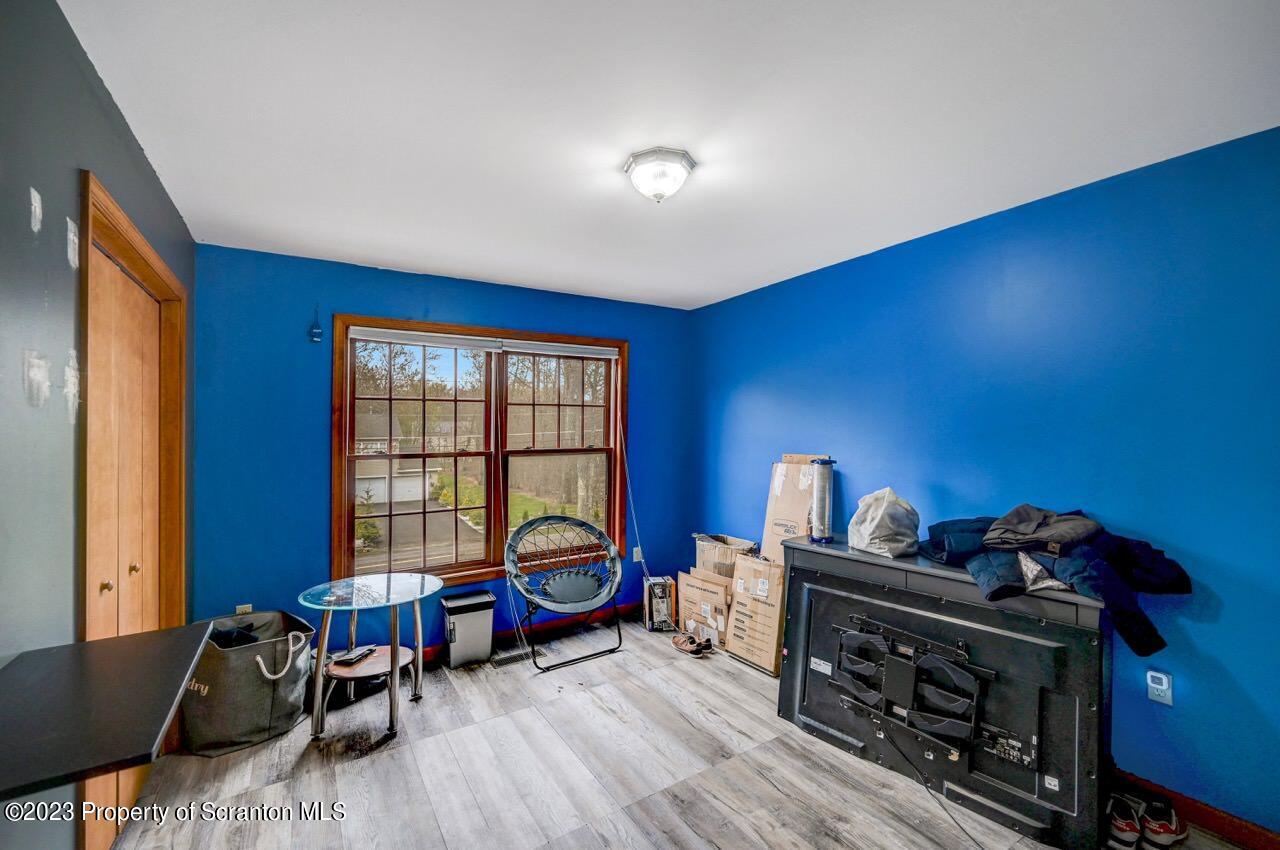 4156 Romeo Road Tobyhanna, PA 18466 - Photo 23 of 46 a living room with furniture and a window