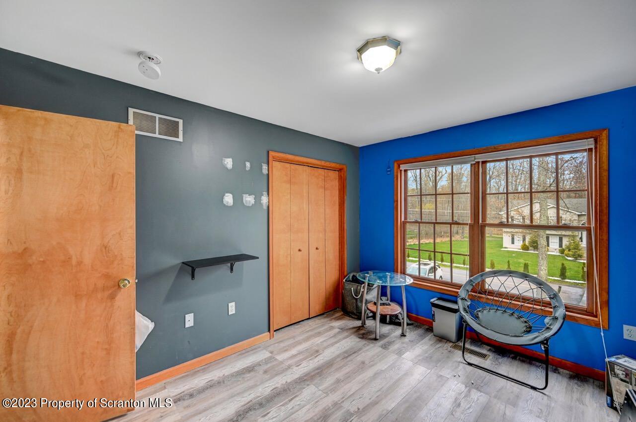 4156 Romeo Road Tobyhanna, PA 18466 - Photo 24 of 46 a bedroom with furniture and a window