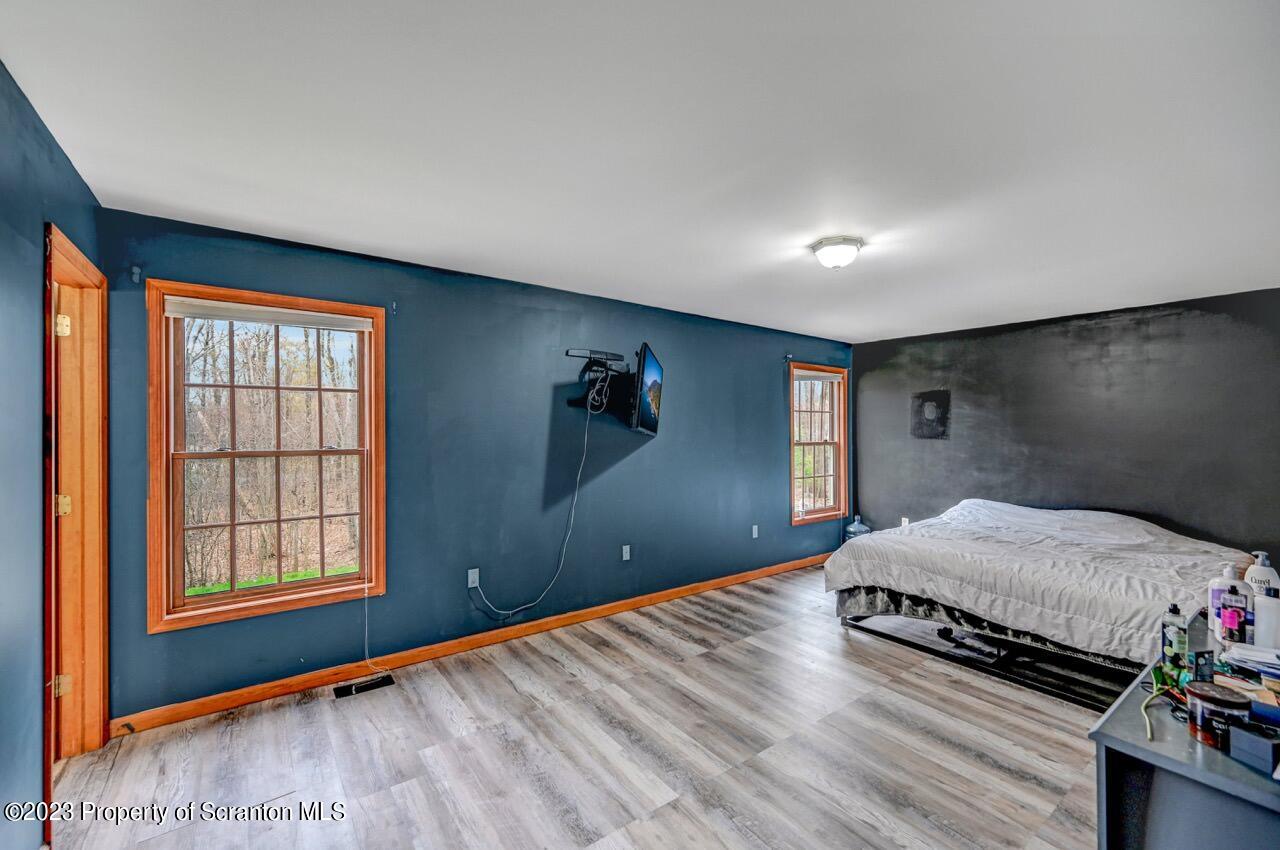 4156 Romeo Road Tobyhanna, PA 18466 - Photo 28 of 46 a bedroom with bed and window
