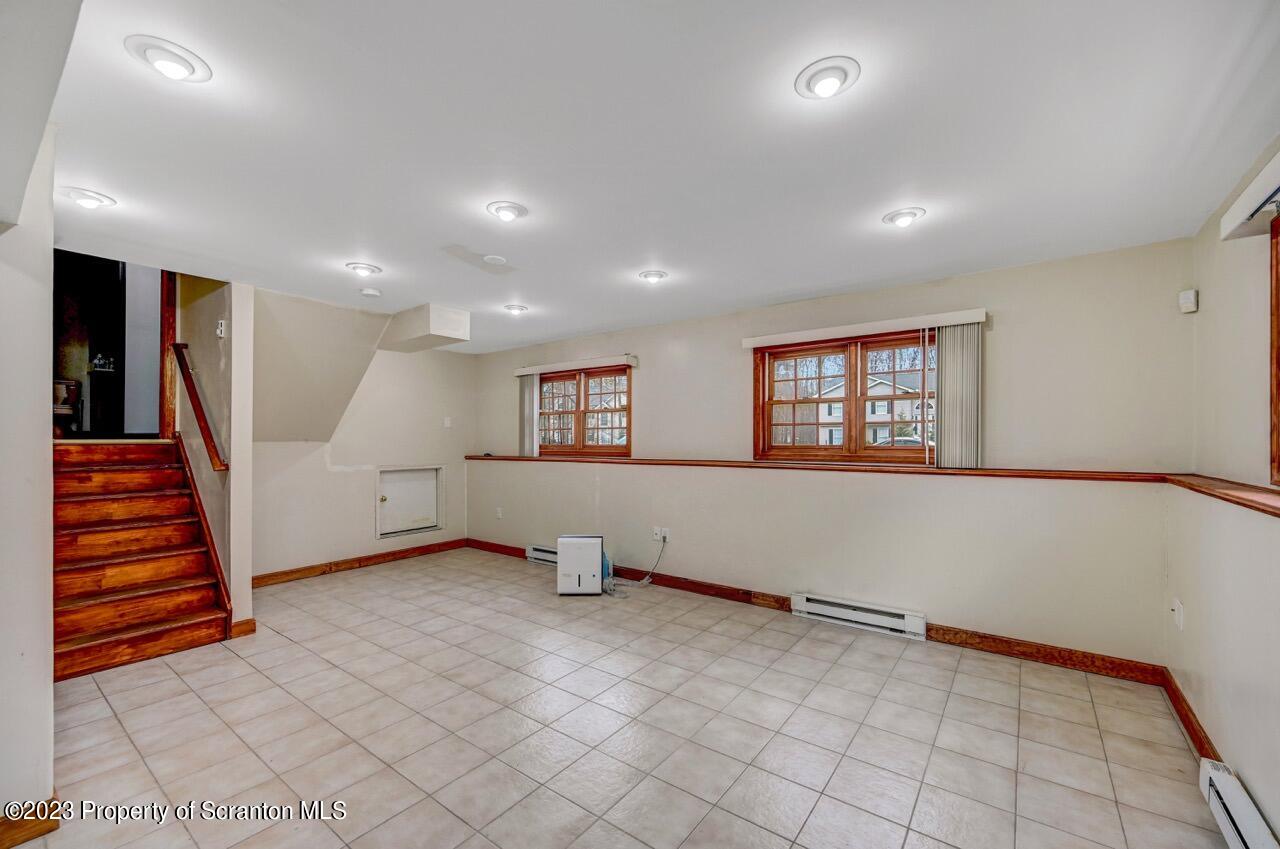 4156 Romeo Road Tobyhanna, PA 18466 - Photo 32 of 46 an empty room with windows