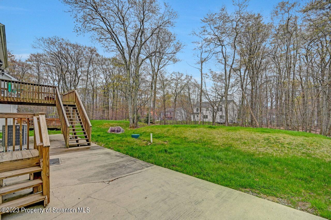 4156 Romeo Road Tobyhanna, PA 18466 - Photo 39 of 46 a view of a garden with large trees