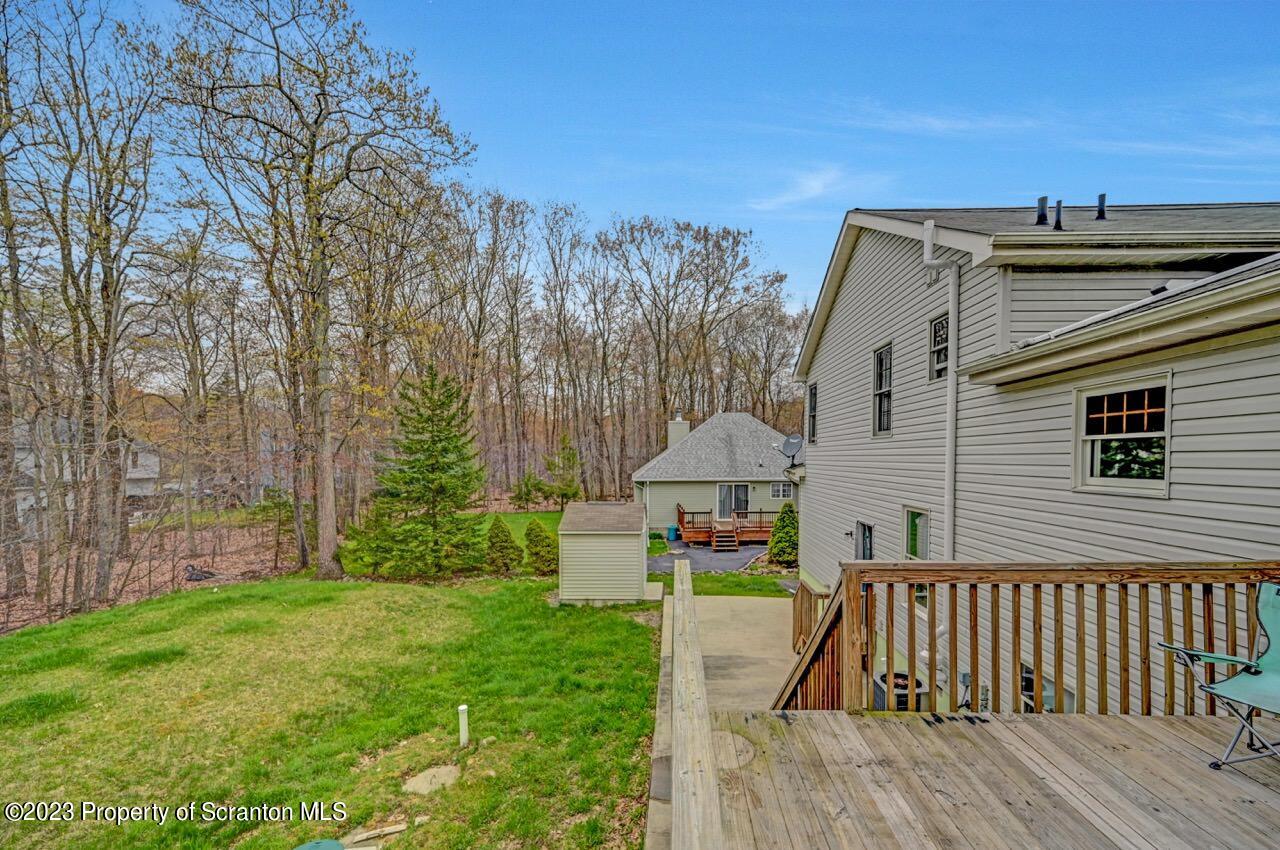 4156 Romeo Road Tobyhanna, PA 18466 - Photo 43 of 46 a view of a house with a yard and furniture