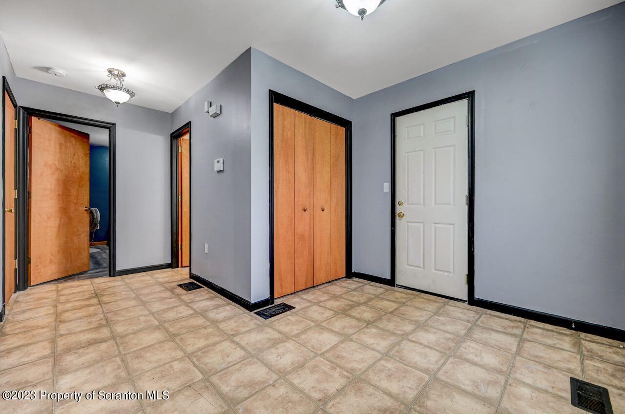 4156 Romeo Road Tobyhanna, PA 18466 - Photo 5 of 46 a view of a room with a large window