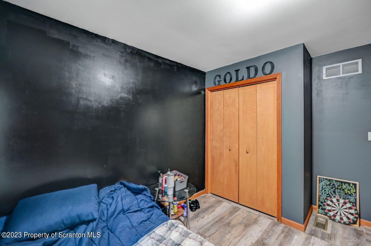4156 Romeo Road Tobyhanna, PA 18466 - Photo 9 of 46 a bedroom with a bed and a window