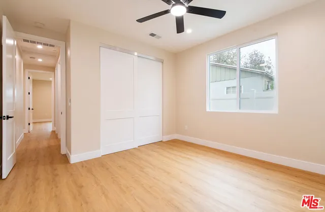 a bathroom with a sink and vanity