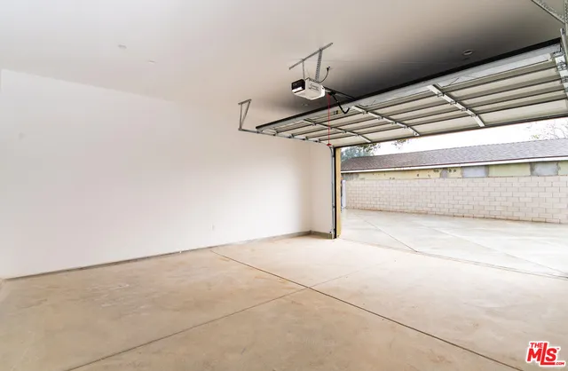 a view of a room with a sink and a window