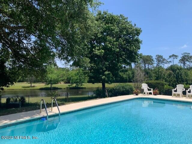224 Lily Road St. Augustine, FL 32086 - Photo 1 of 52 a view of a lake with a park