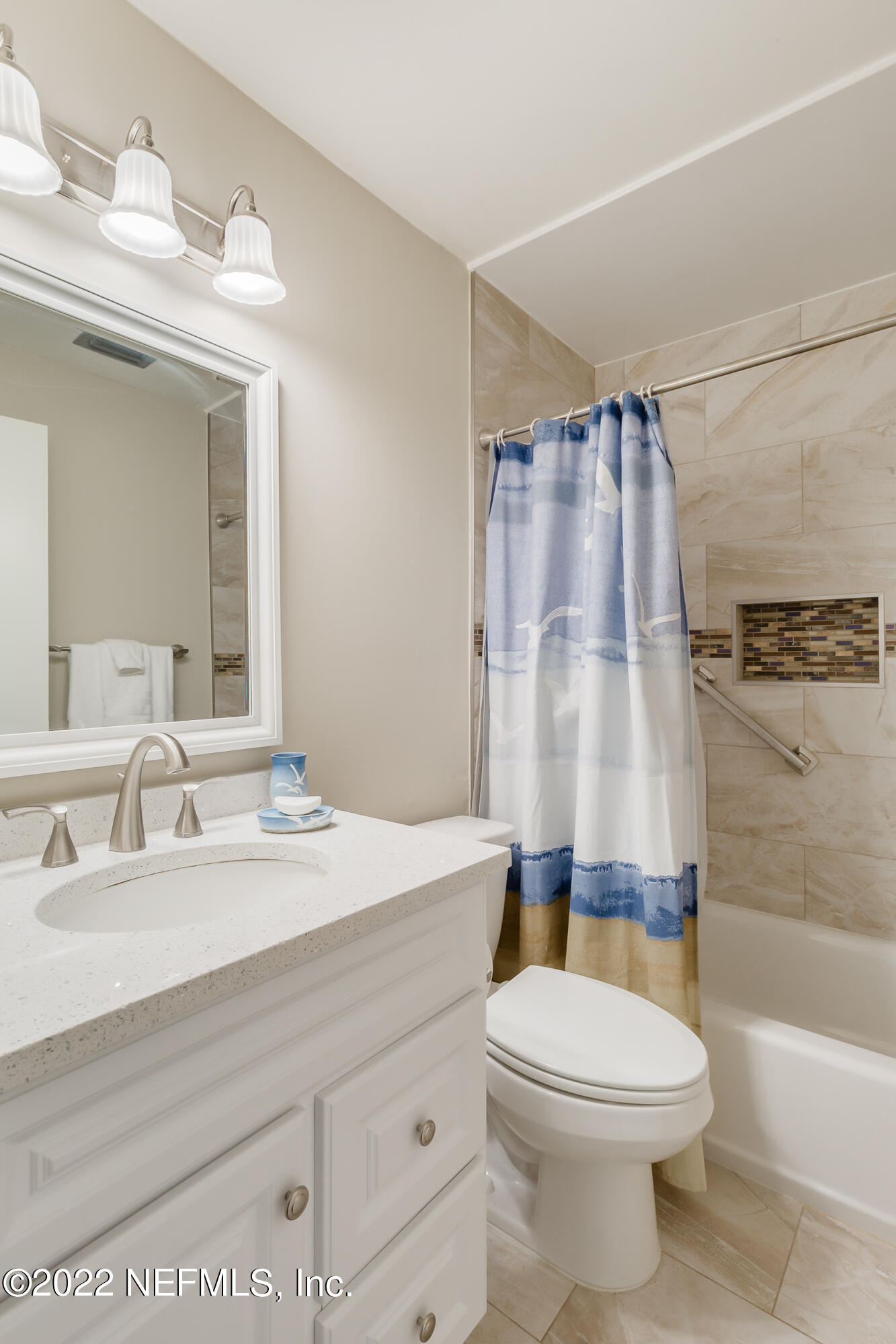 224 Lily Road St. Augustine, FL 32086 - Photo 18 of 52 a bathroom with a sink a toilet and shower