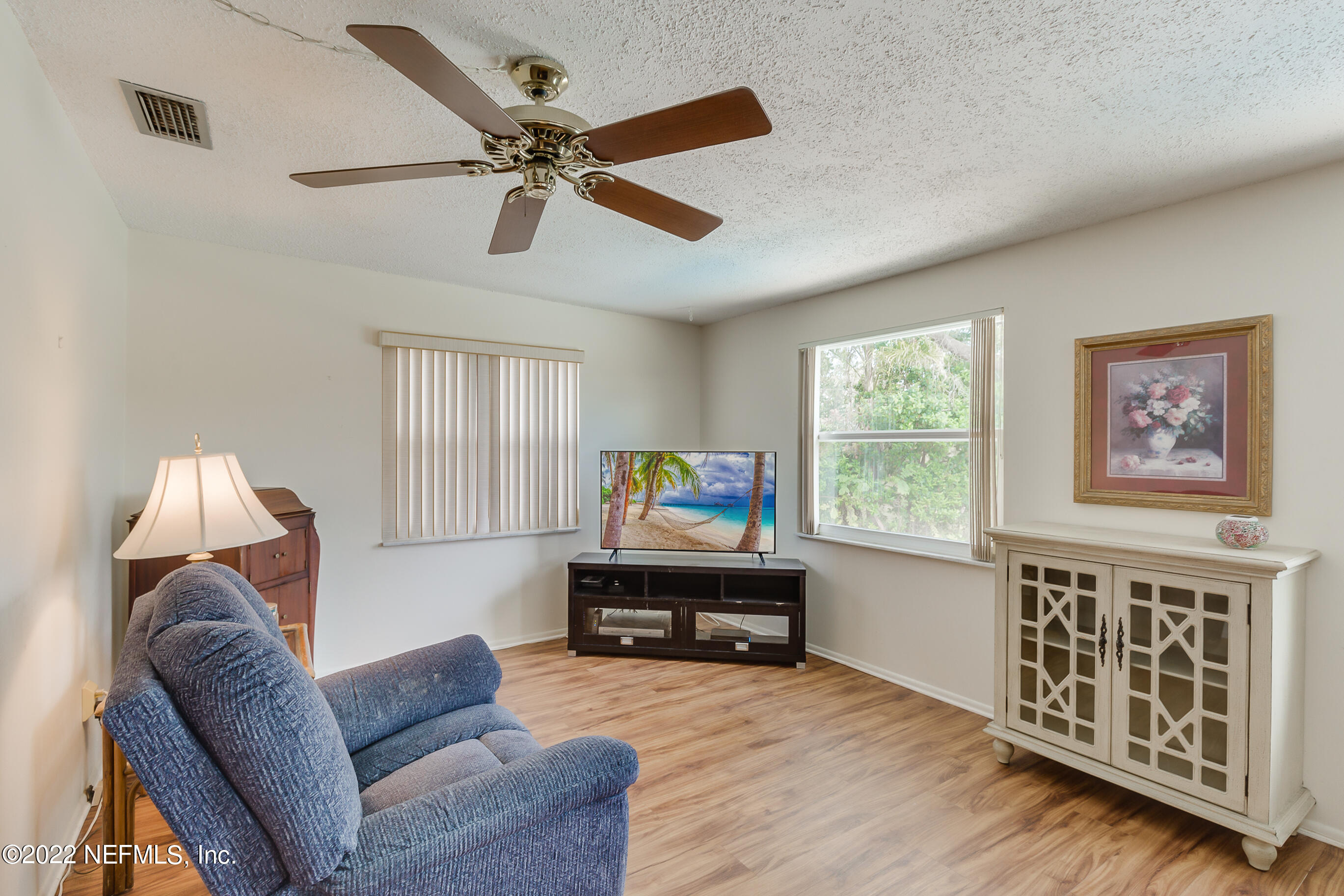 224 Lily Road St. Augustine, FL 32086 - Photo 21 of 52 a living room with furniture and a window