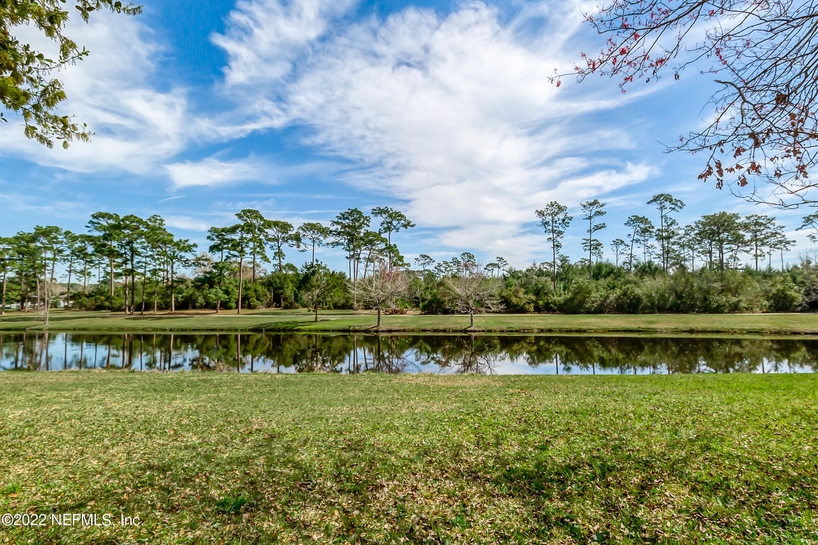 224 Lily Road St. Augustine, FL 32086 - Photo 36 of 52 a view of a lake with a lake in the background