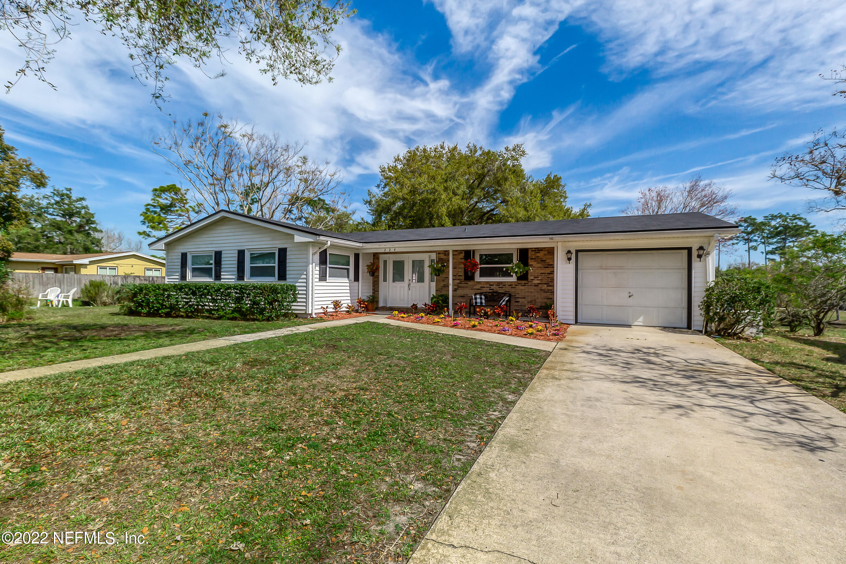 224 Lily Road St. Augustine, FL 32086 - Photo 43 of 52 front view of house with a yard
