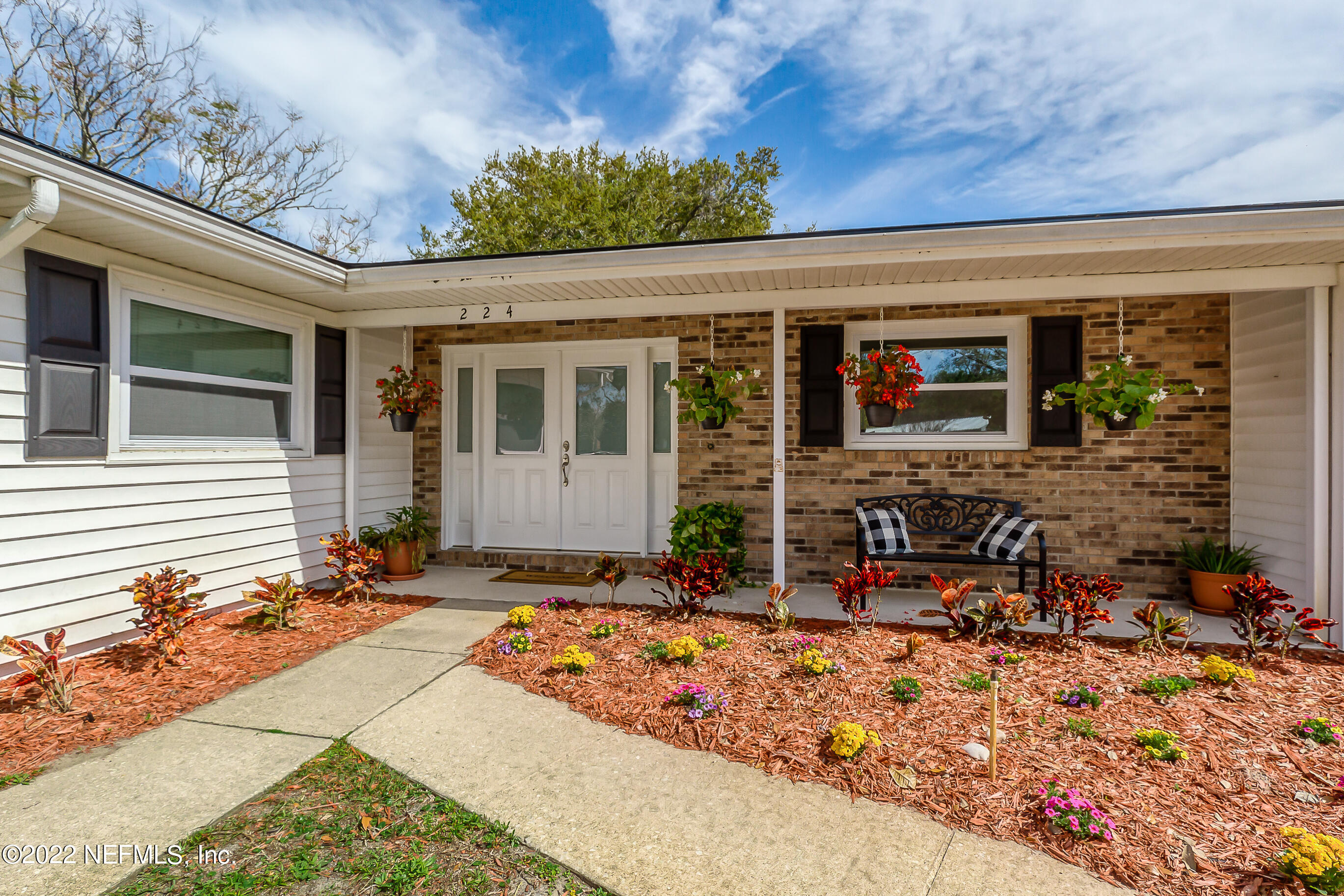 224 Lily Road St. Augustine, FL 32086 - Photo 44 of 52 a view of house with patio outdoor seating