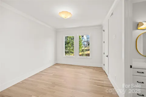 a view of hallway with natural light