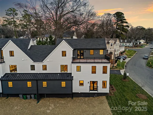 aerial view of a house with a yard