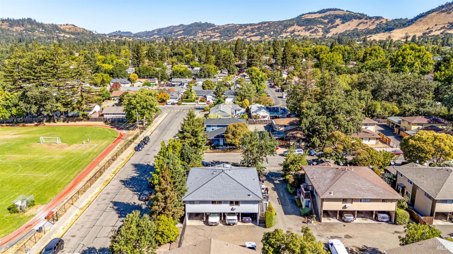 5020 Roma Street Santa Rosa, CA 95409 - Photo 11 of 29 an aerial view of residential houses with outdoor space and swimming pool