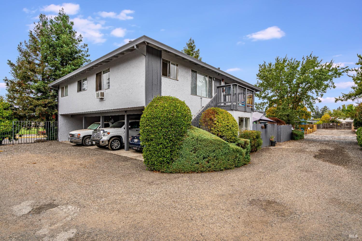 5020 Roma Street Santa Rosa, CA 95409 - Photo 14 of 29 a view of a house with a patio and a yard