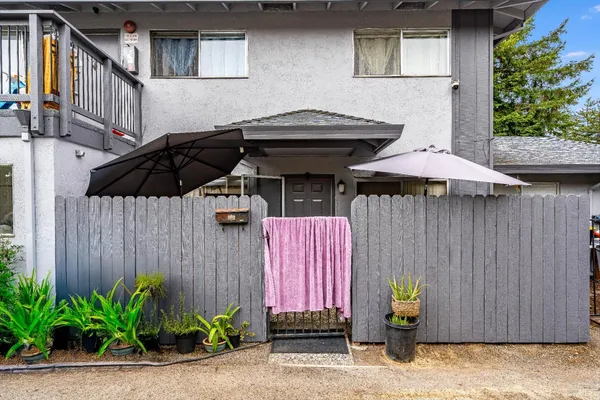 a front view of a house with a glass door