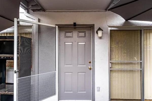 a view of a city with a lake