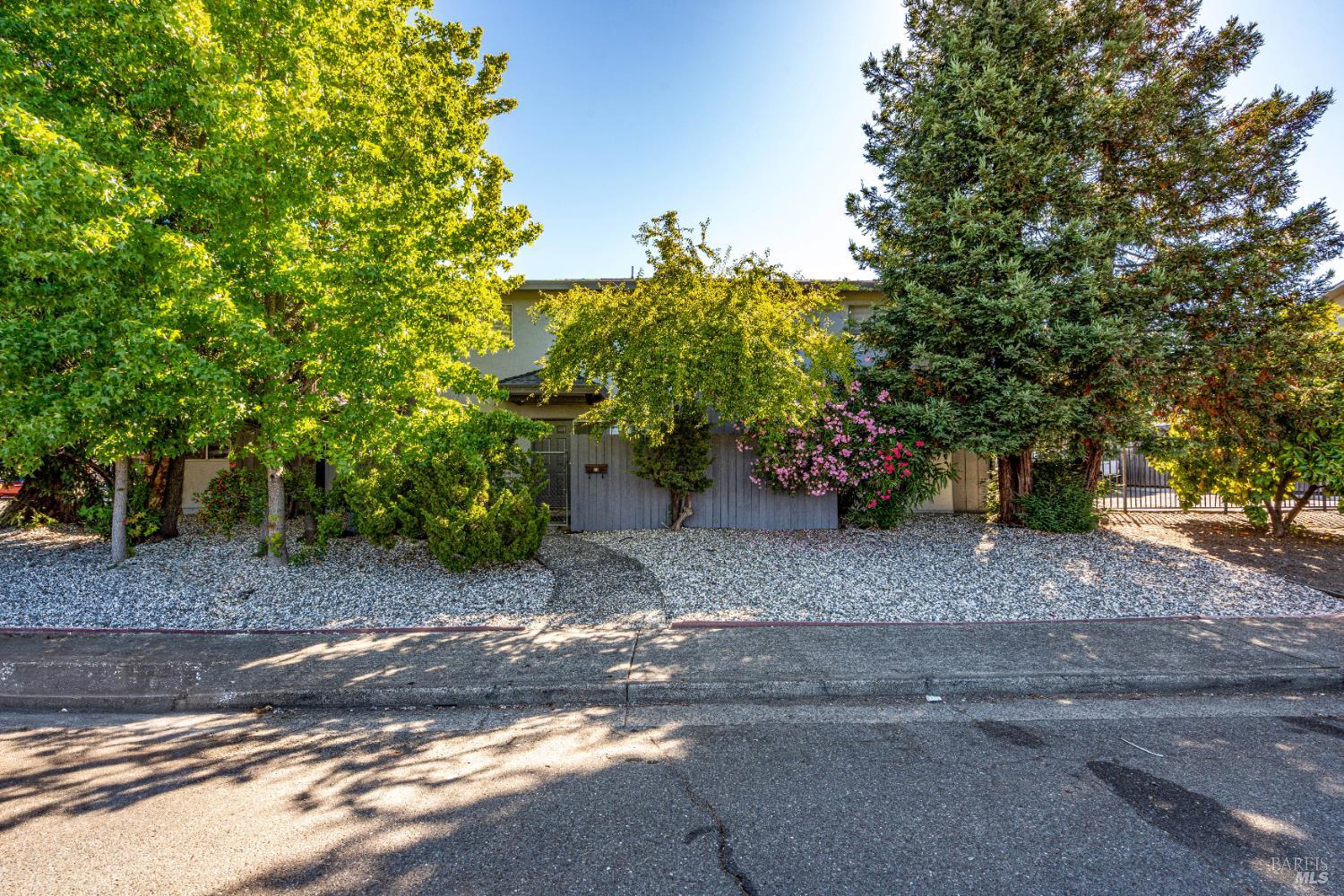 5020 Roma Street Santa Rosa, CA 95409 - Photo 8 of 29 a view of a yard with plants and trees
