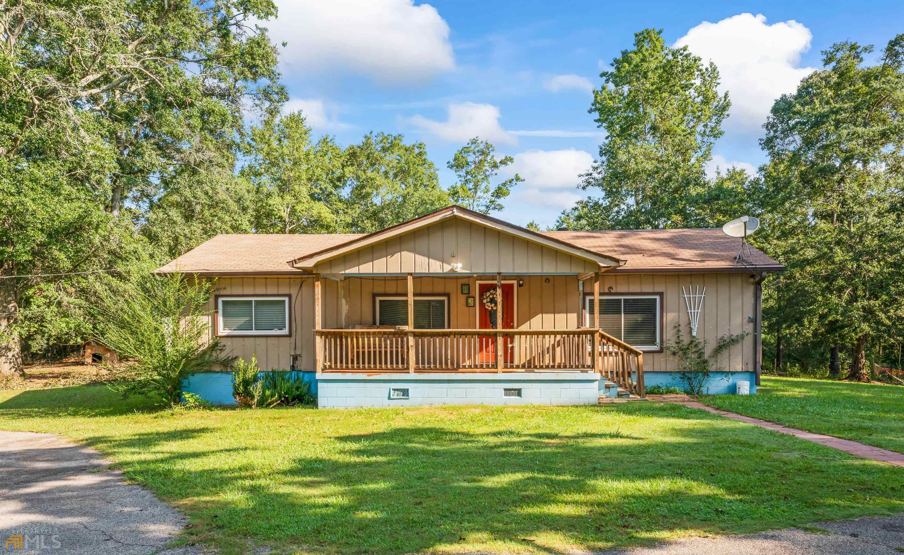 343 Yamacraw Road Griffin, GA 30223 - Photo 1 of 1 a front view of house with yard and green space