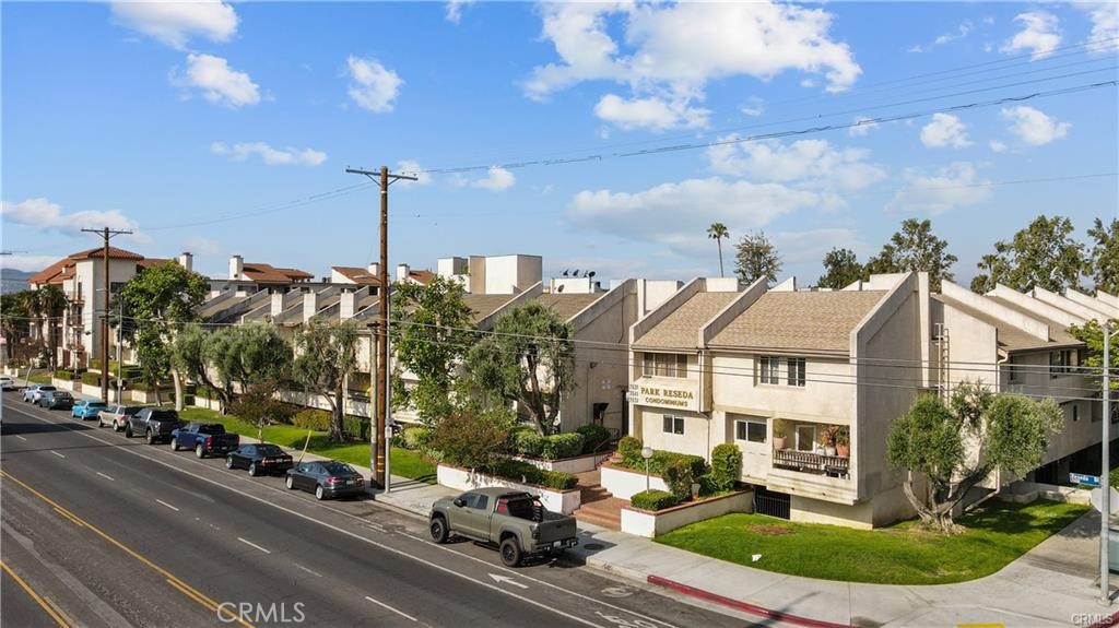 7641 Reseda Boulevard, Unit 87 Reseda, CA 91335 - Photo 1 of 37 a view of a street with cars parked