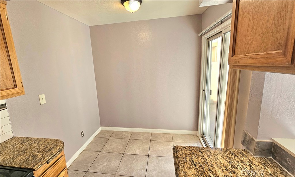 7641 Reseda Boulevard, Unit 87 Reseda, CA 91335 - Photo 13 of 37 a bedroom with a bed and a window