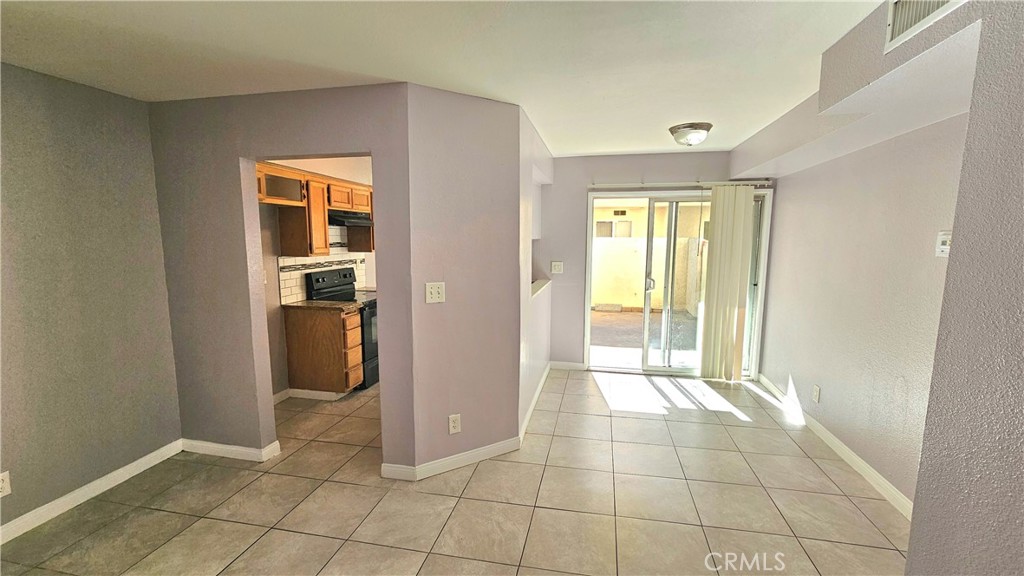 7641 Reseda Boulevard, Unit 87 Reseda, CA 91335 - Photo 17 of 37 a view of a hallway with closet and a window