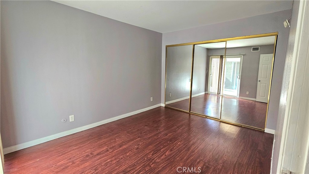 7641 Reseda Boulevard, Unit 87 Reseda, CA 91335 - Photo 23 of 37 a view of wooden floor in an empty room