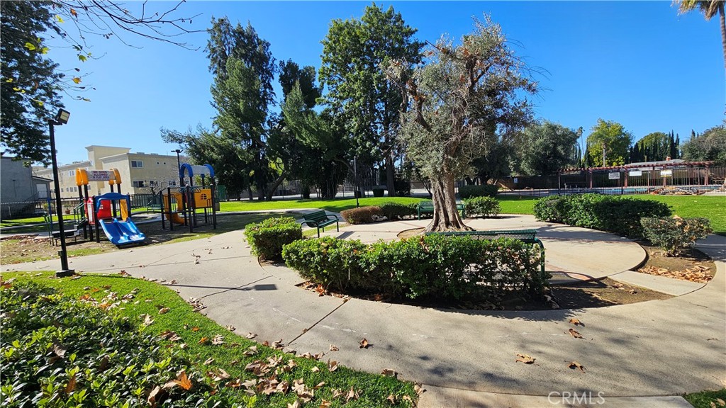 7641 Reseda Boulevard, Unit 87 Reseda, CA 91335 - Photo 32 of 37 a view of a park with large trees