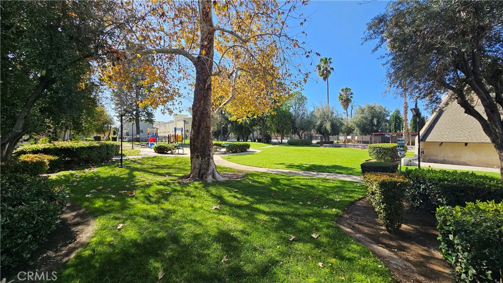 7641 Reseda Boulevard, Unit 87 Reseda, CA 91335 - Photo 5 of 37 a view of a park with large trees
