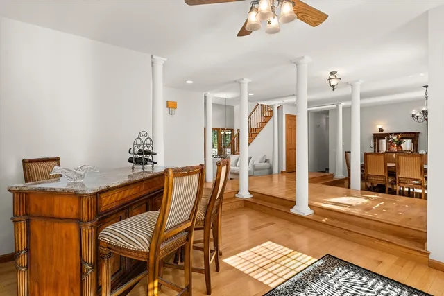 a dining room with a table and chairs