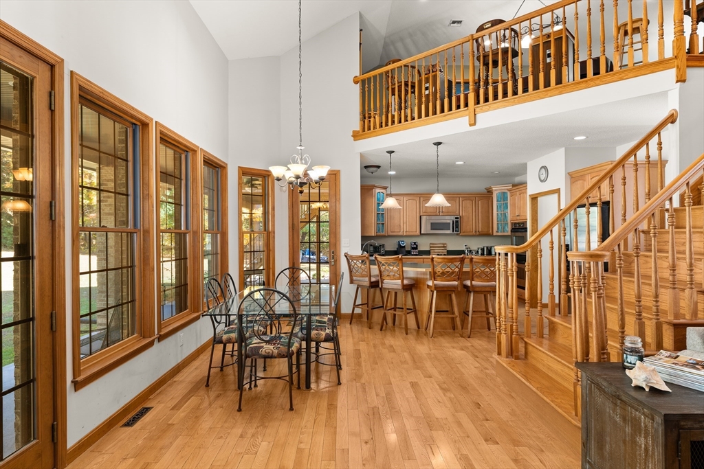 59 St Germain Road Hampden, MA 01036 - Photo 16 of 42 a dining room with furniture entryway and wooden floor