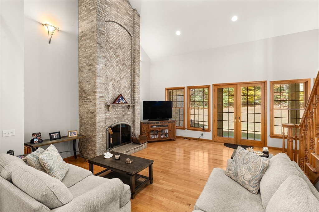 59 St Germain Road Hampden, MA 01036 - Photo 17 of 42 a living room with furniture and a fireplace