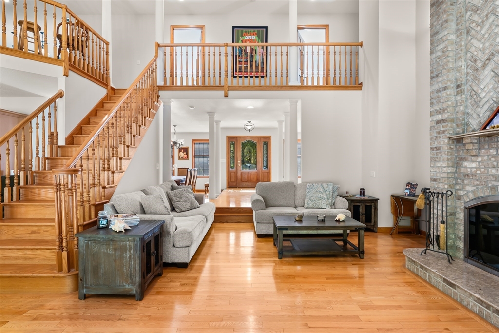 59 St Germain Road Hampden, MA 01036 - Photo 19 of 42 a living room with furniture and a fireplace